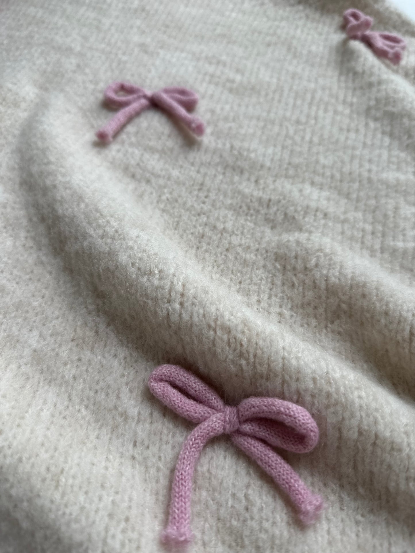 Schleifen Pullover