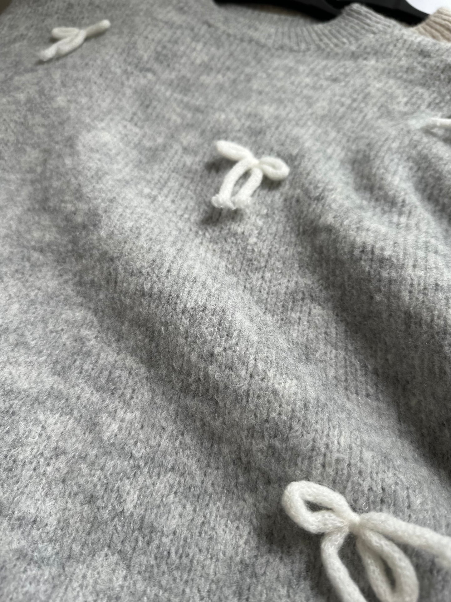 Schleifen Pullover
